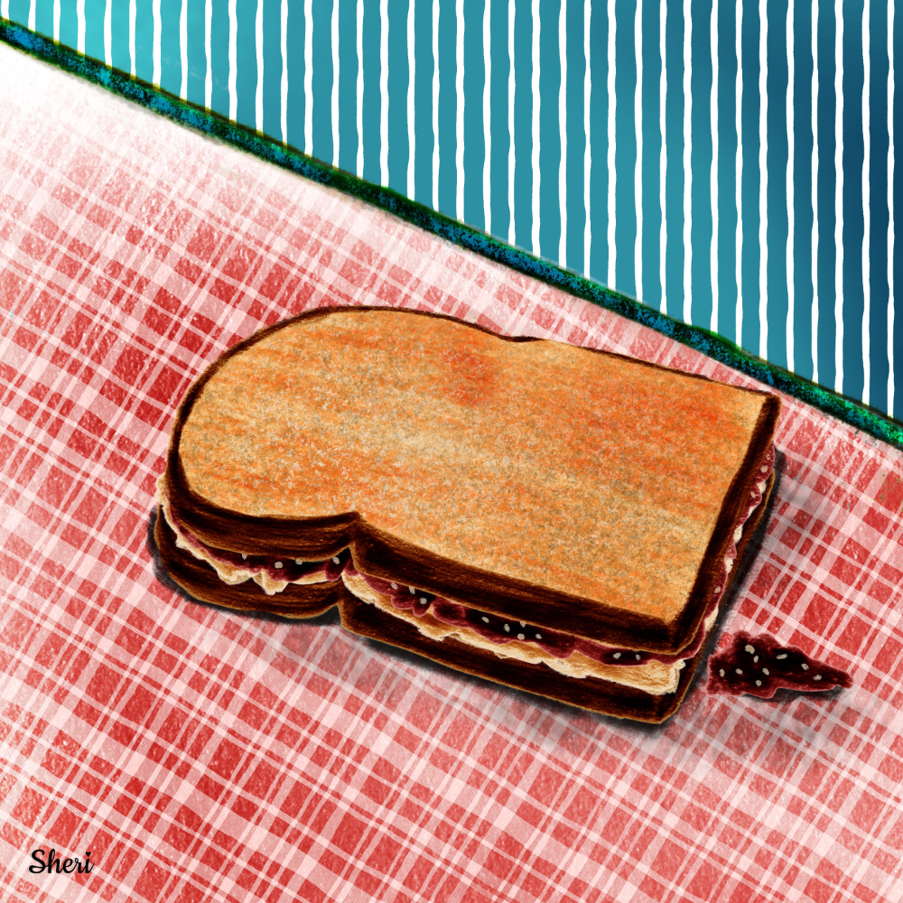 peanut butter and jelly sandwich on red plaid counter with blue striped wall and a bit of spilled raspberry jelly