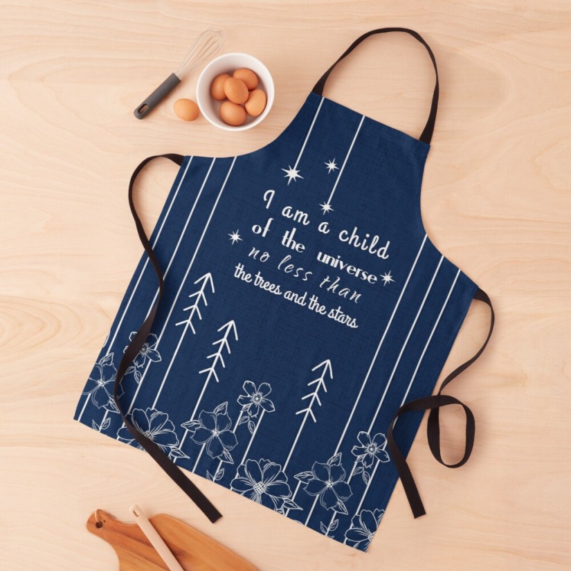 apron white on blue with quote :I am a child of the universe, no less than the trees and the stars