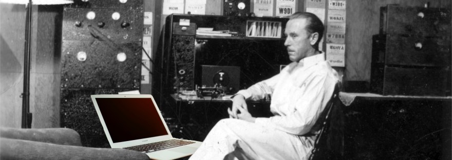 black and white photo of old ham radio operator with an upgrade to a modern computer laptop