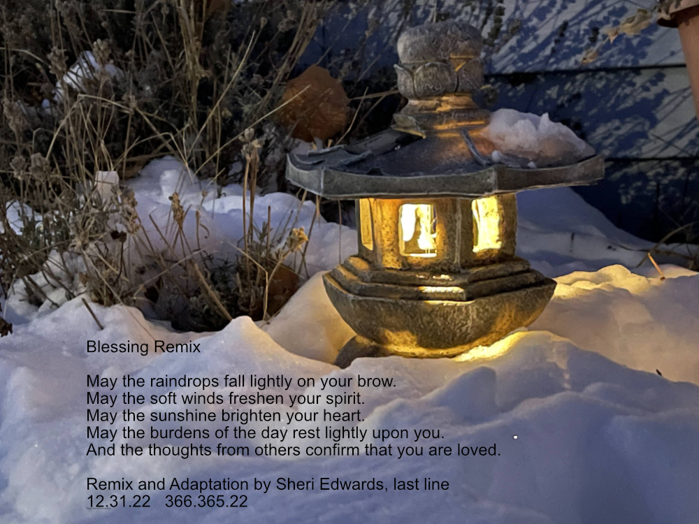 An Ishidoro lantern shining in the night snow