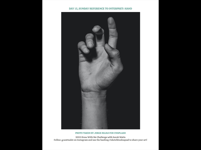 hand held up, palm facing camera, in almost a peace sign with dark background