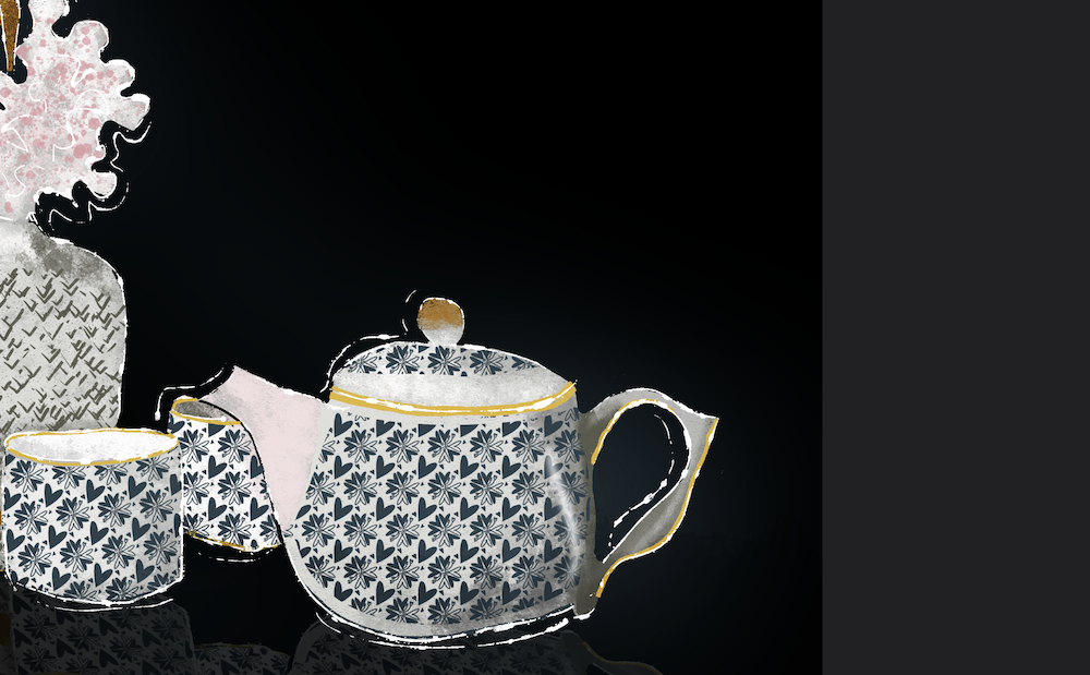 Vase of pinkish flowers, blue floral cups and tea pot ready for tea time on dark reflecting surface