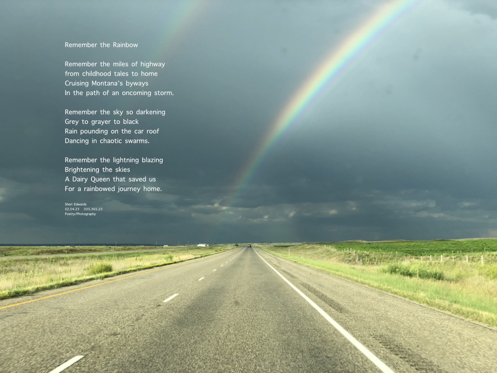 double rainbow in the dark, stormy Big Sky above Montana's highways