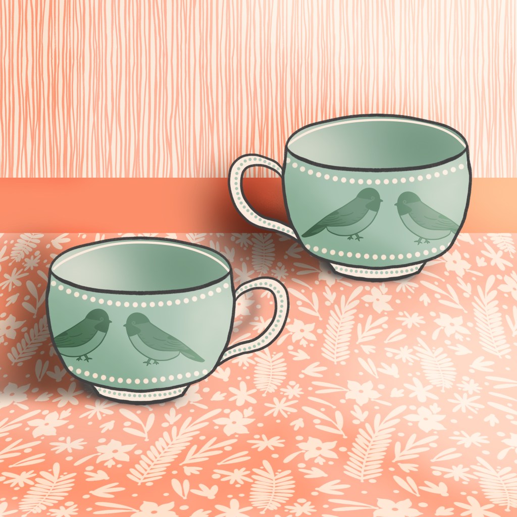 Matching cups with chickadee motifs
