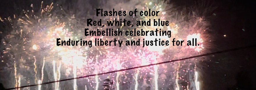My favorite part of the fireworks: a quieter display of surging lights in red, white, and blue shooting upwards over Grand Coulee Dam.