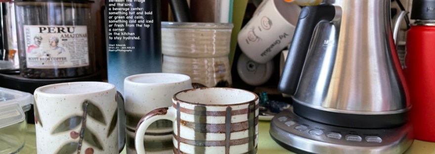 Tea pot, mugs, coffee, tea, water bottles, coffee pot unseen to the left: all ready to keep hydrated.