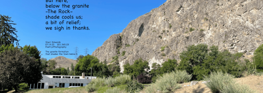 The granite formation that shades the town below it.