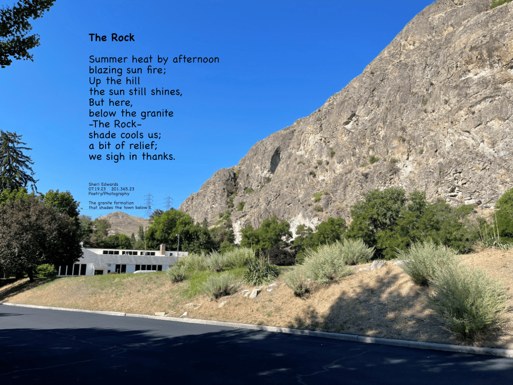 The granite formation that shades the town below it.