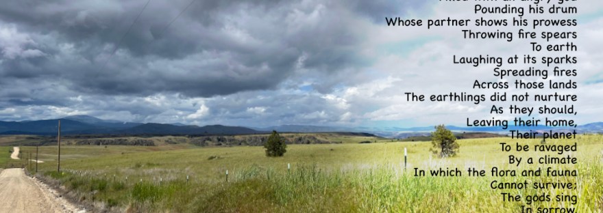 Douglas County looking towards Moses Mountain as the storm clouds gather over the spring green fields.