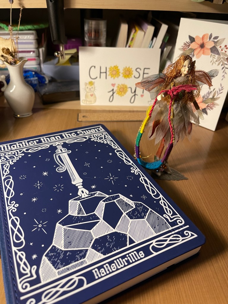 NaNoWriMo notes journal with Ashlyn's fairy as inspiration
