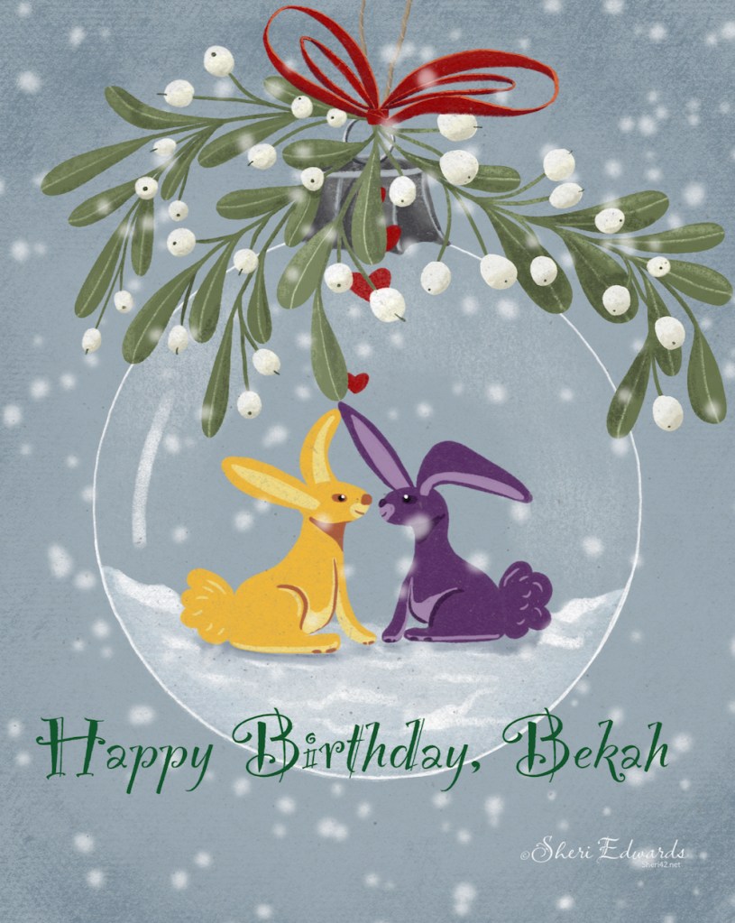 birthday card with two rabbits in clear ornament topped with mistletoe and red ribbon in snowfall
