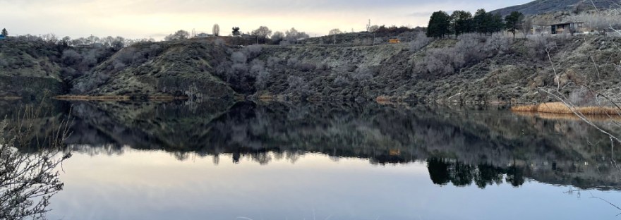 Crescent Bay Lake with reflection, including school bus