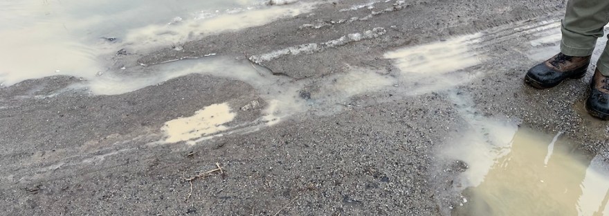 the melting snow and rain create mini-rivers and lakes