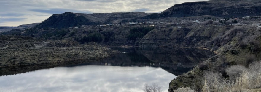 reflections in Crescent Bay Lake look like another world