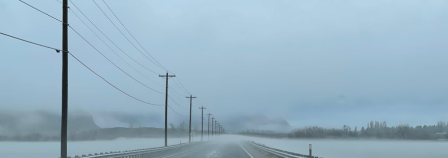 Driving over the causeway at Banks Lake, we slowed down to capture the layers of fog, one even flowing over the roadway. Stunning.