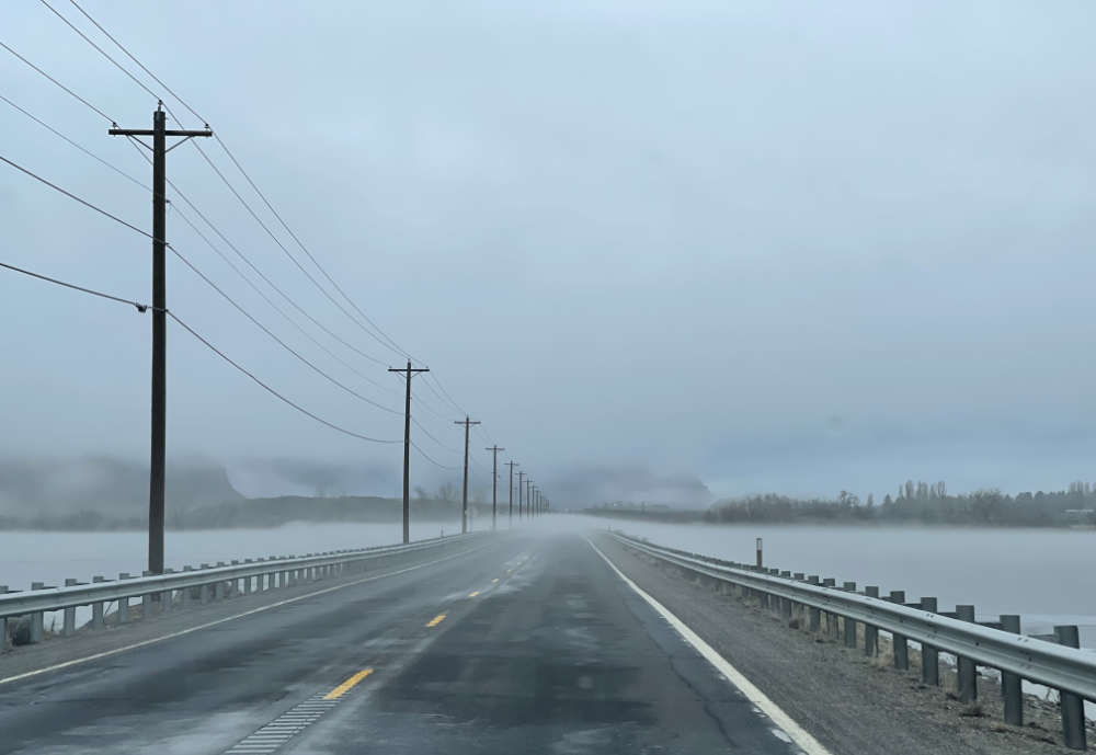 Driving over the causeway at Banks Lake, we slowed down to capture the layers of fog, one even flowing over the roadway. Stunning.
