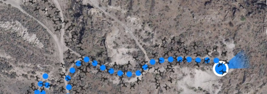 Me sitting on boulder and the path we took to get their