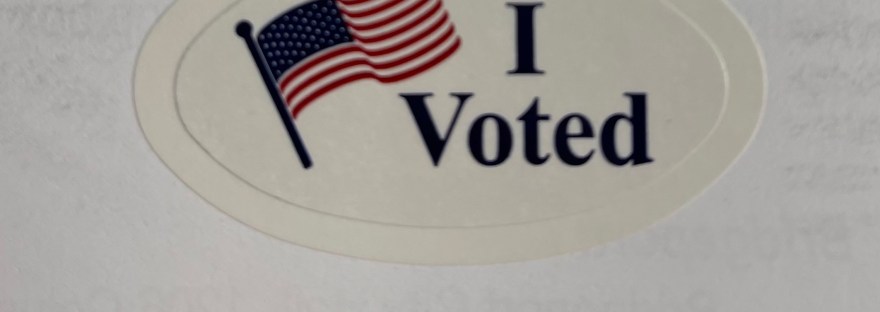 My sticker on my voting ballot ready to peal and wear