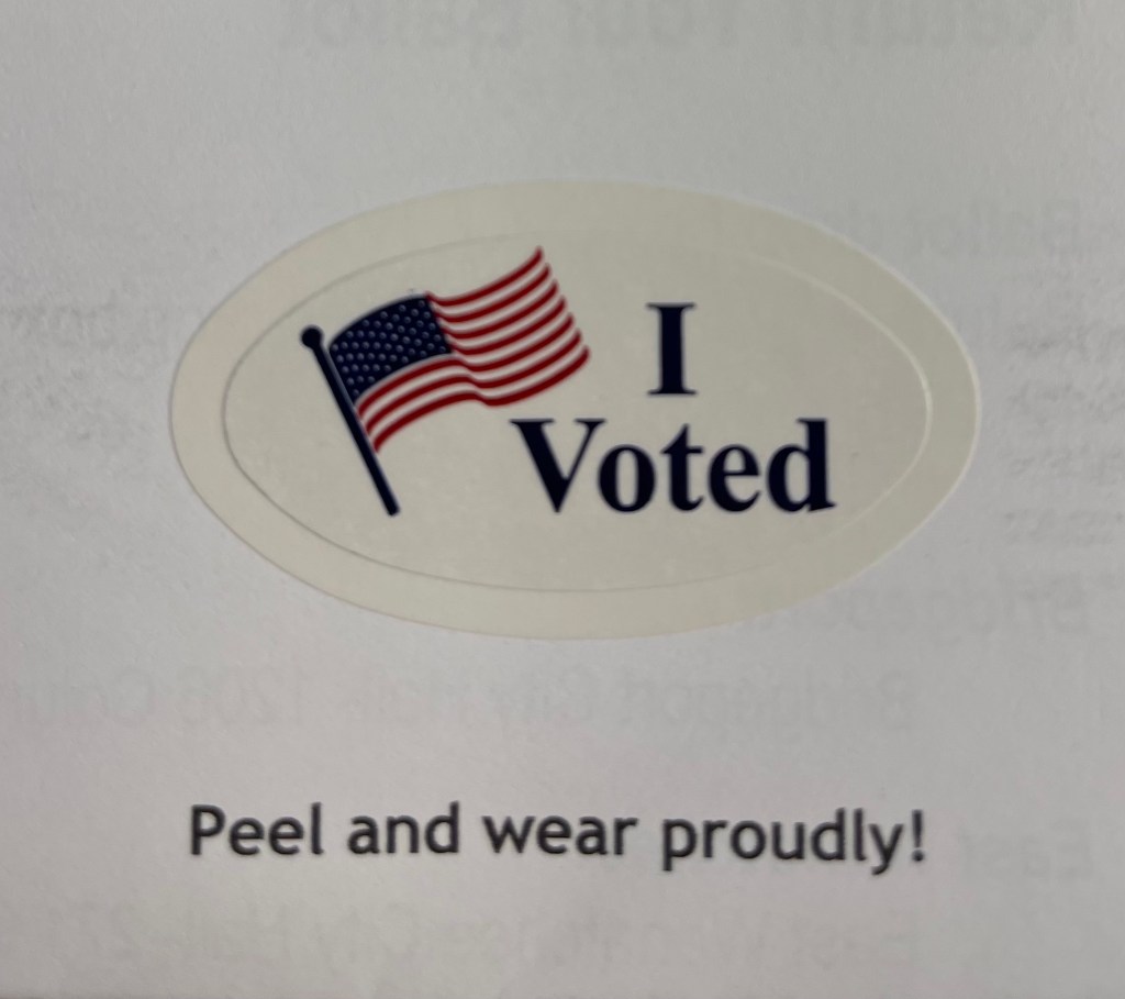 My sticker on my voting ballot ready to peal and wear