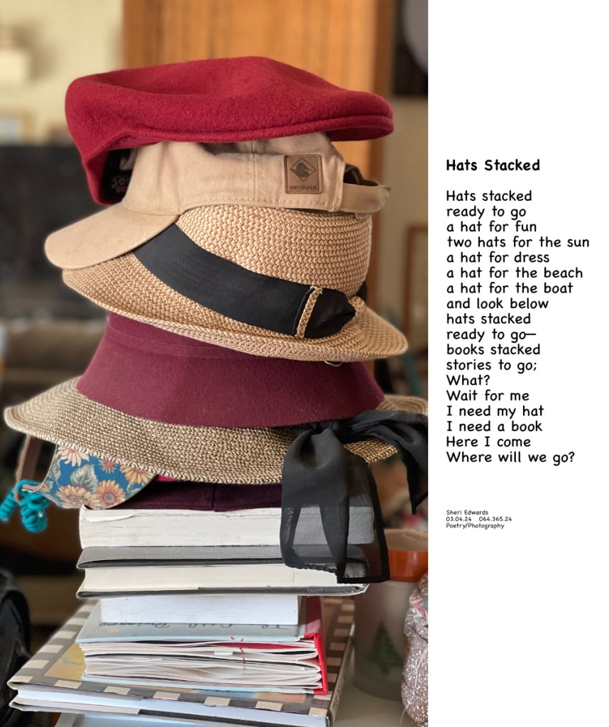 hats stacked on books stacked and poem