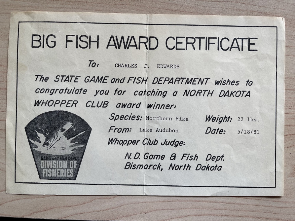 Big Fish Award Certificate to Charles J Edwards from the Game and Fish Department Division of Fisheries for his 22 pound northern pike caught on 5.18.81 at Lake Audubon, ND.