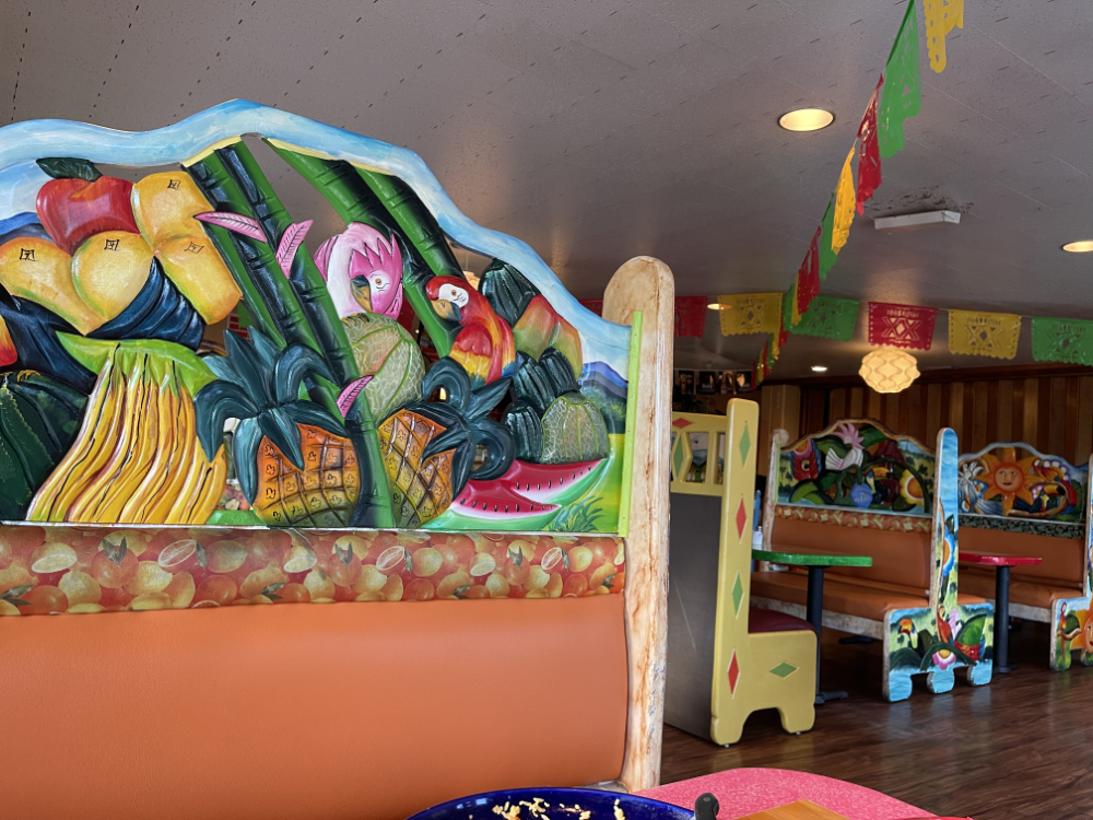 local Mexican restaurant creates festive mood with its bright colorful art