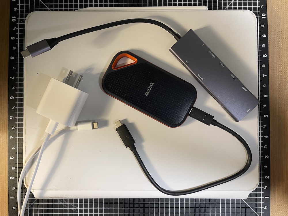 backup solution: hard drive, hub, charger, iPad