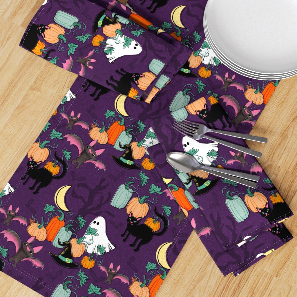 table runner with Halloween design of retro cats, bats, and witches hats by Sheri42