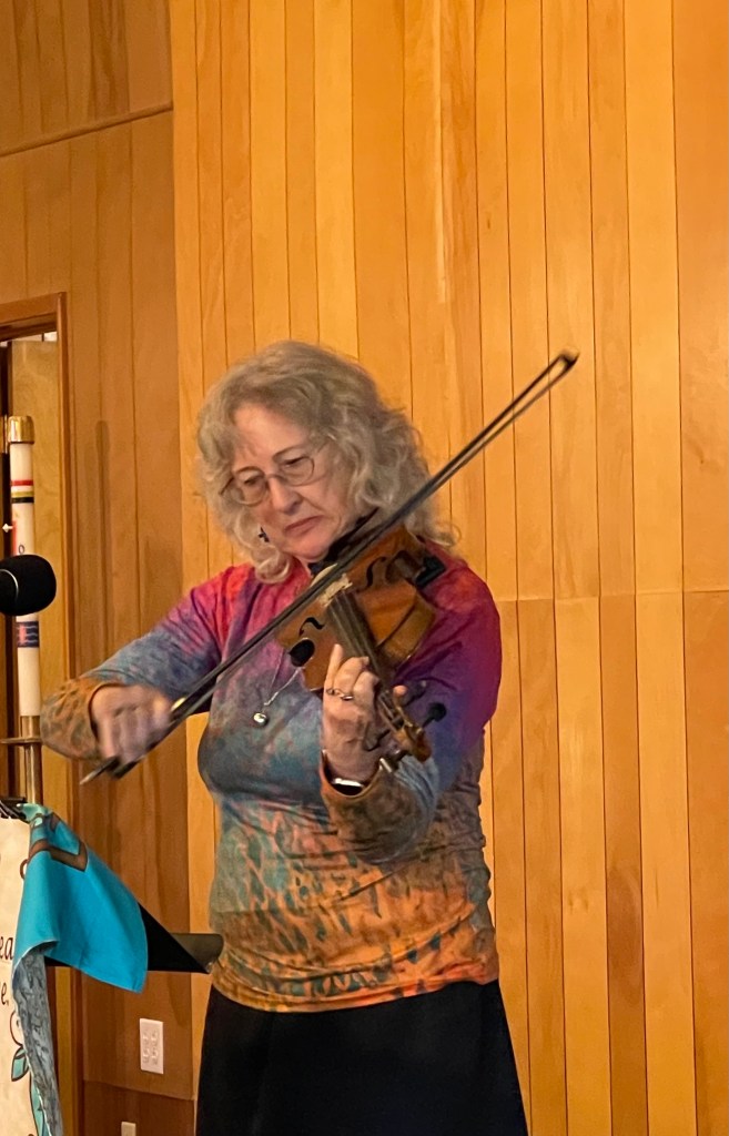 Local musicians gather for Play Music on the Porch Day with a community potluck
