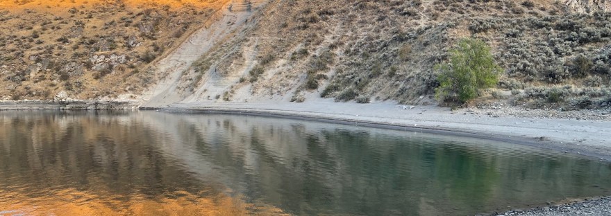 Sunset reflections at Crescent Bay on Lake Roosevelt National Recreation Area
